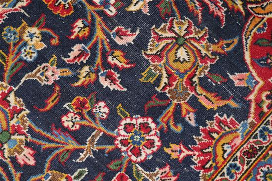 An Iranian Kashan carpet, 12ft 6in. by 8ft 11in.
